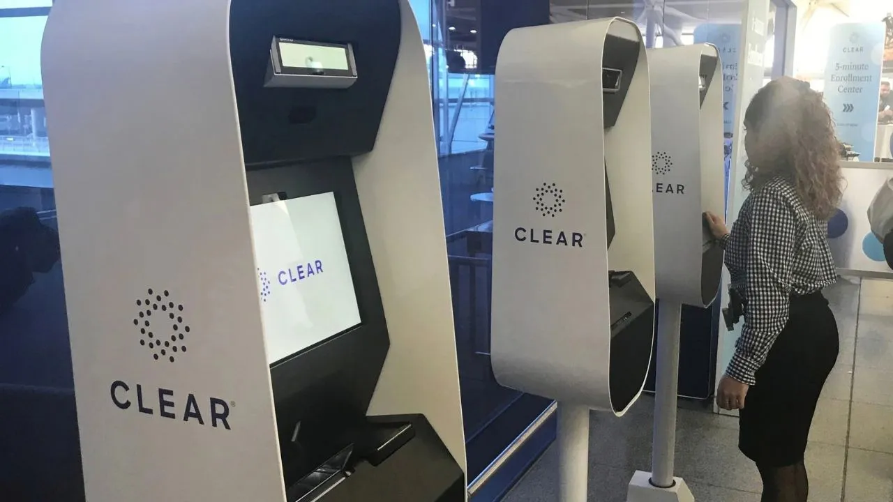 Passenger using the CLEAR security scanner at BNA